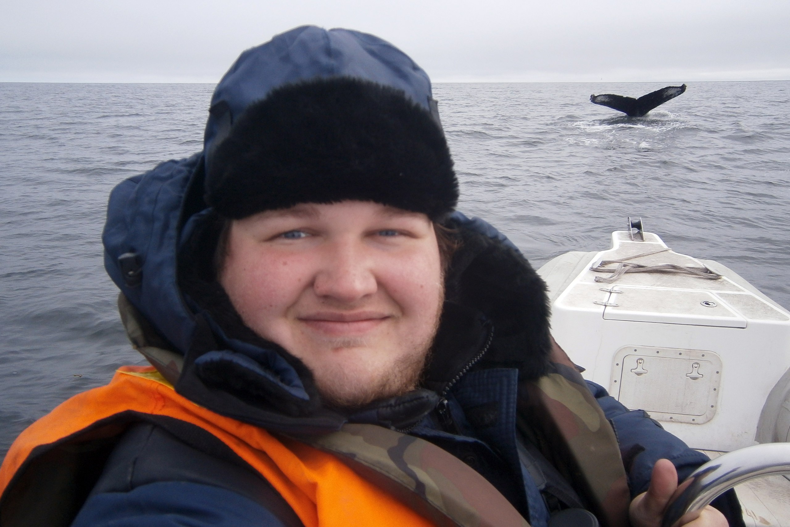 Alexander Sidorov during marine counts of cetaceans in the water area of the reserve. Photo by Alexander Sidorov