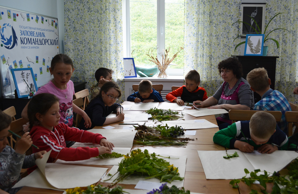 A lesson with botanist in the Commander Islands Reserve visit-center. Photo by the Commander Islands Reserve